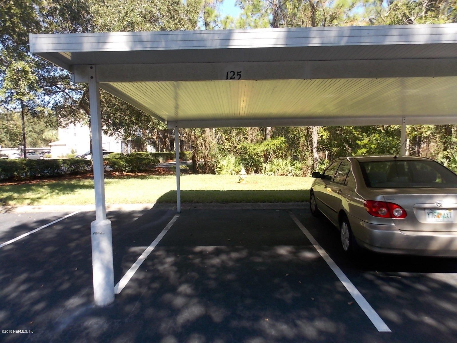 10550 Baymeadows Road, Unit 125 Jacksonville, FL 32256 - Photo 17 of 22 Covered Assigned Parking