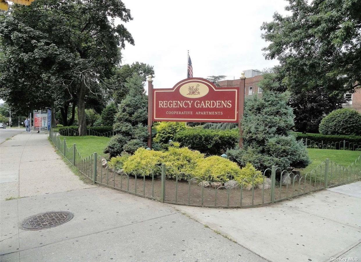 141-41 78th Road, Unit 3N Queens, NY 11367 - Photo 1 of 1 a view of a park with bench and trees