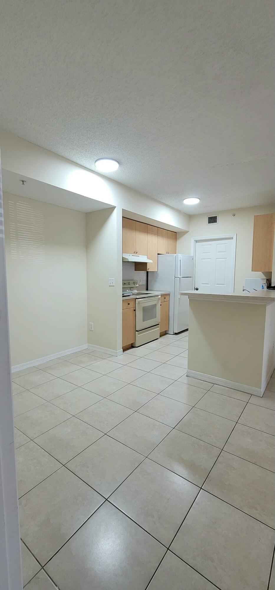 5032 Lantana Road, Unit 2105 Lake Worth, FL 33463 - Photo 5 of 15 a view of a storage & utility room