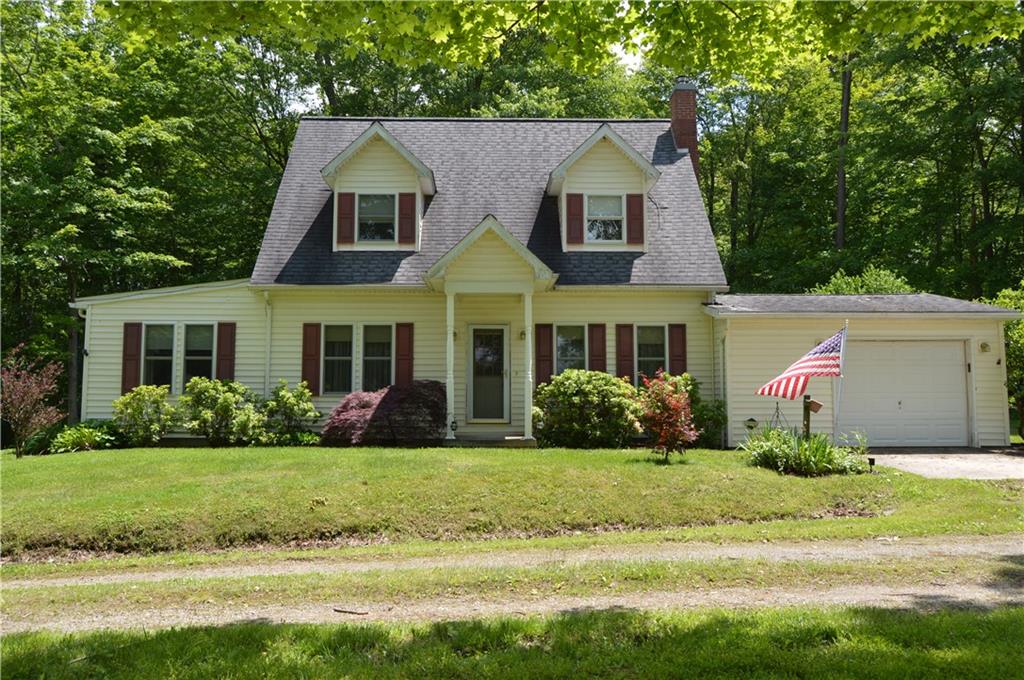 3244 Maple Lane Jamestown, PA 16134 - Photo 1 of 27 a front view of a house with a yard