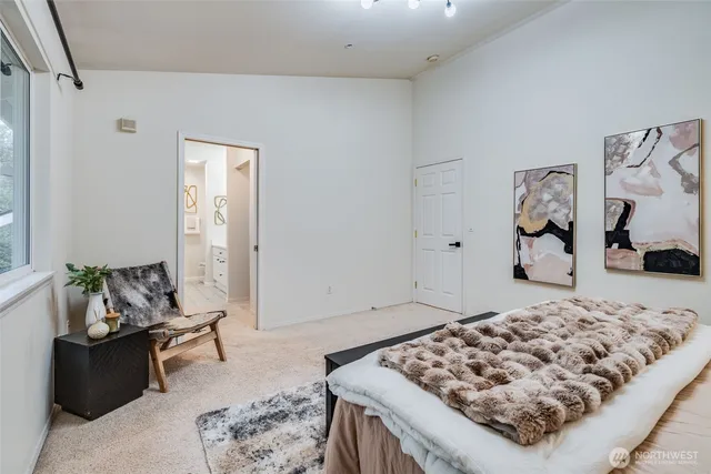 a view of hallway with wooden floor