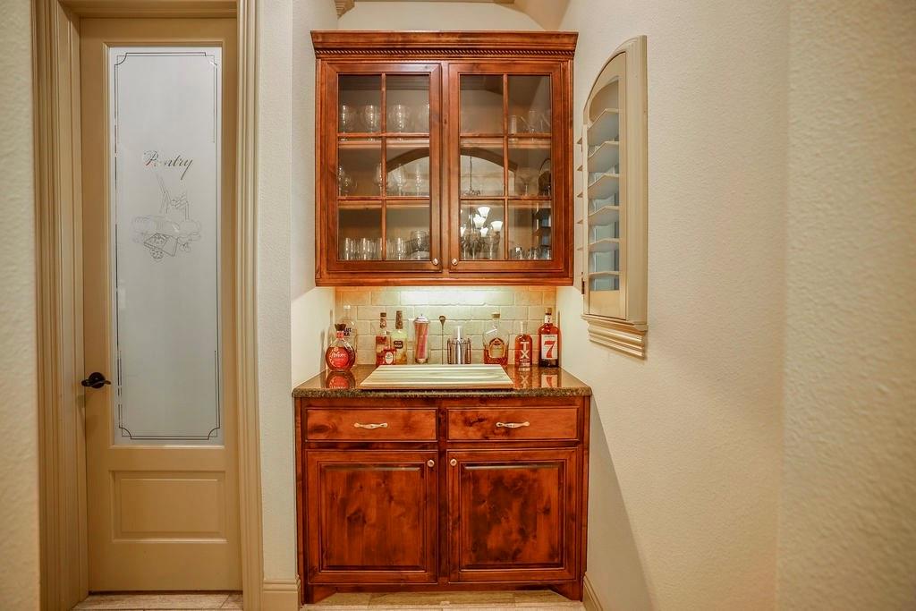 1387 Shadow Lakes Drive Wills Point, TX 75169 - Photo 13 of 33 a bathroom with a sink and a mirror