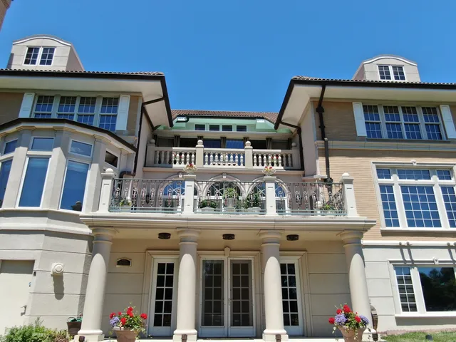an aerial view of a house with a garden