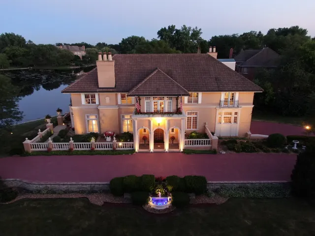 en empty room with windows and ceiling fan