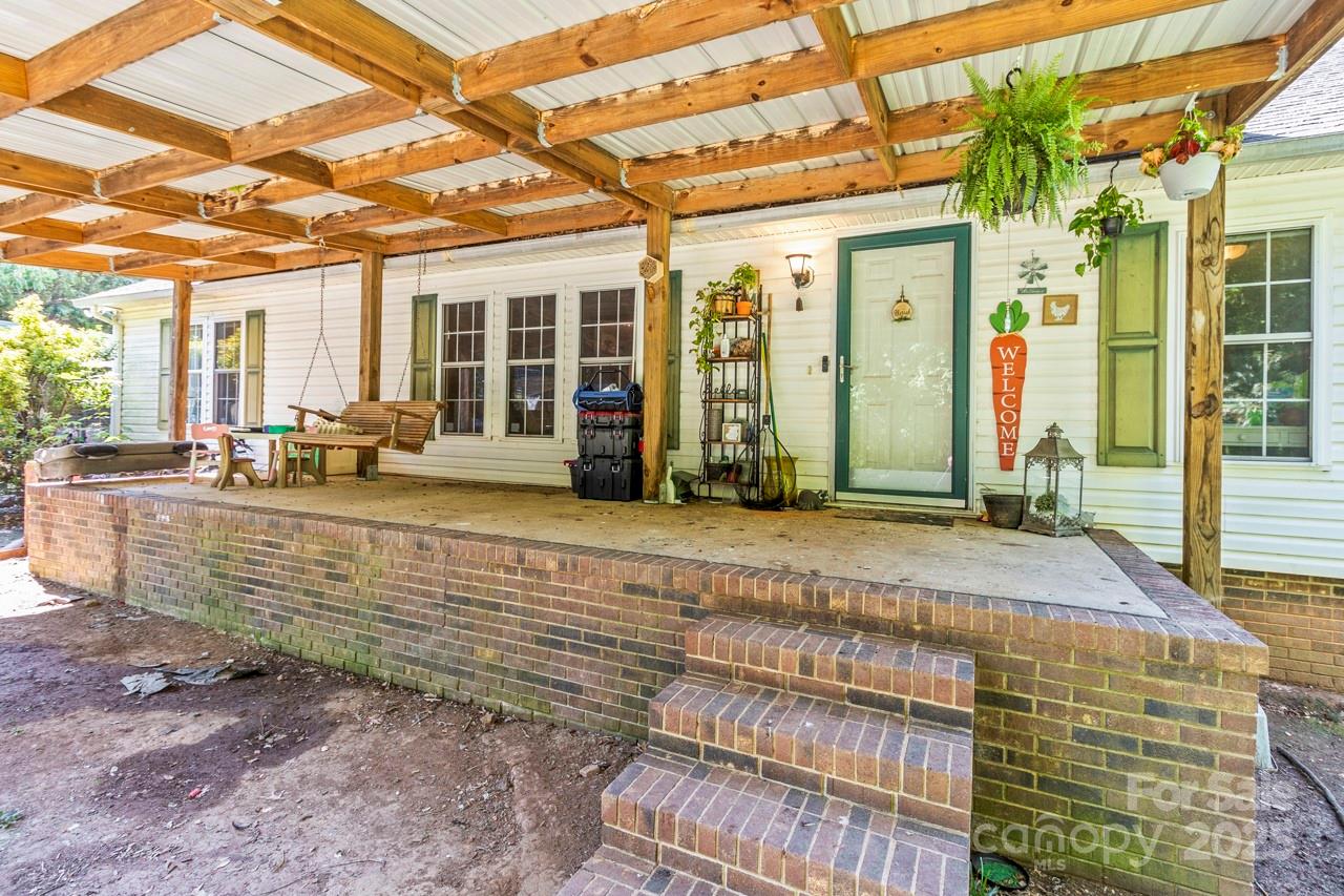 4155 Slanting Bridge Road Sherrills Ford, NC 28673 - Photo 12 of 34 a view of a house with sitting area