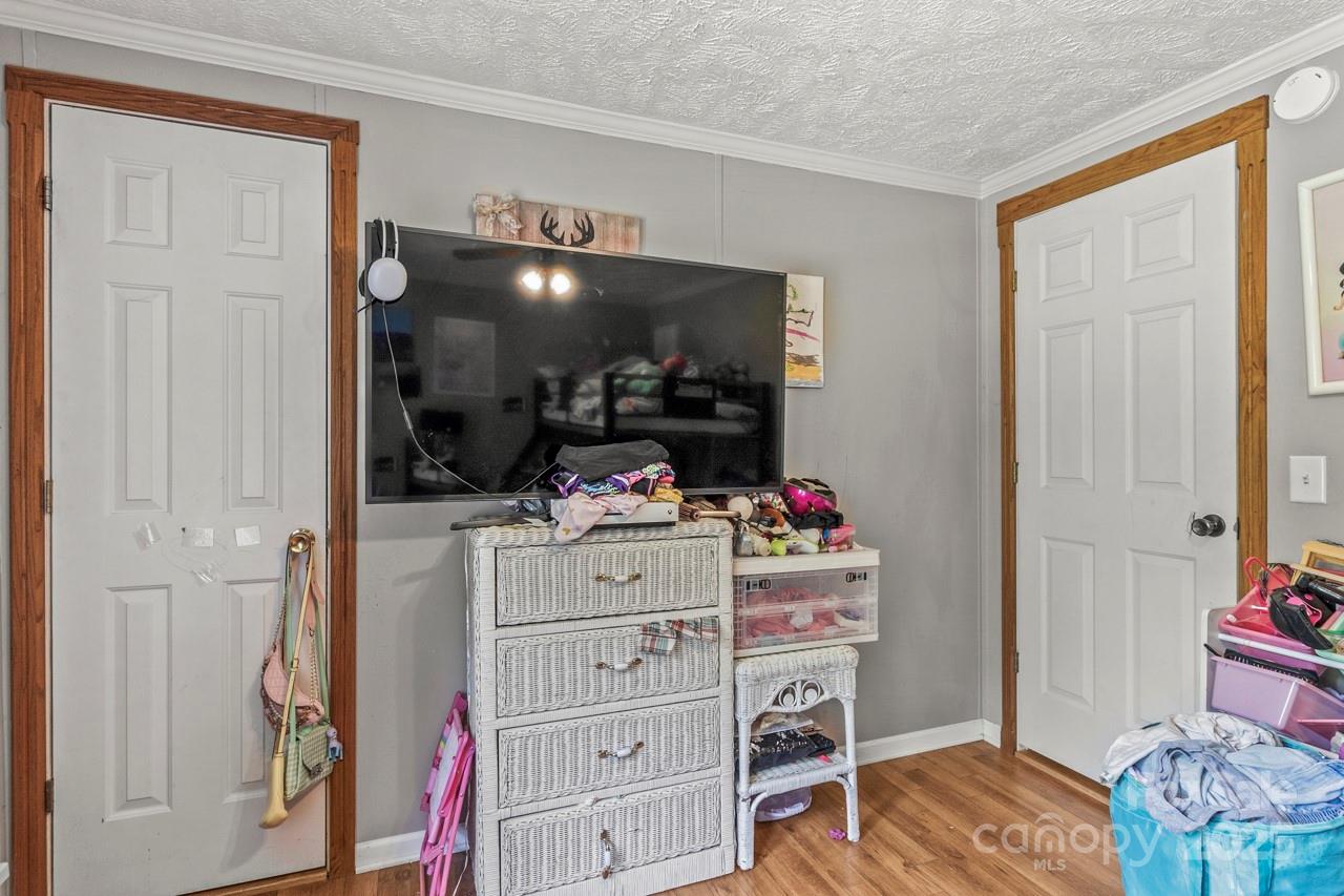 4155 Slanting Bridge Road Sherrills Ford, NC 28673 - Photo 30 of 34 a view of room with wooden floor and closet
