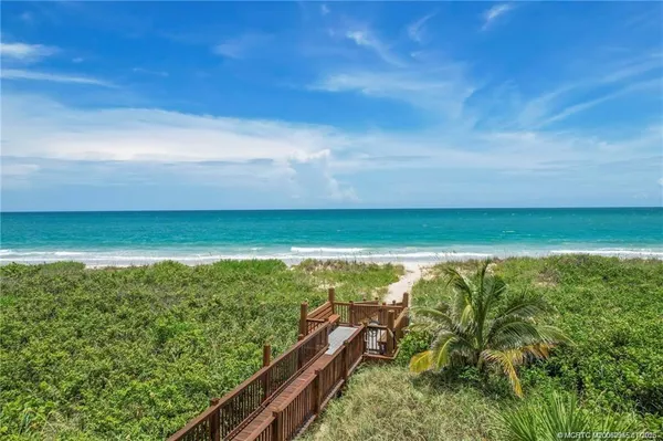 a view of an ocean from a balcony