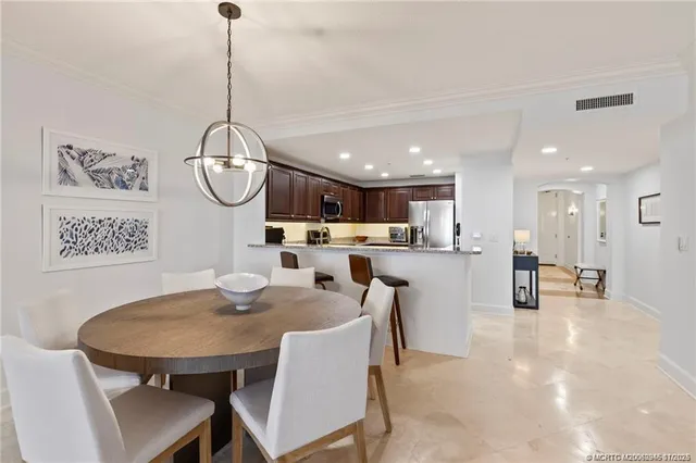 a view of a dining room and livingroom