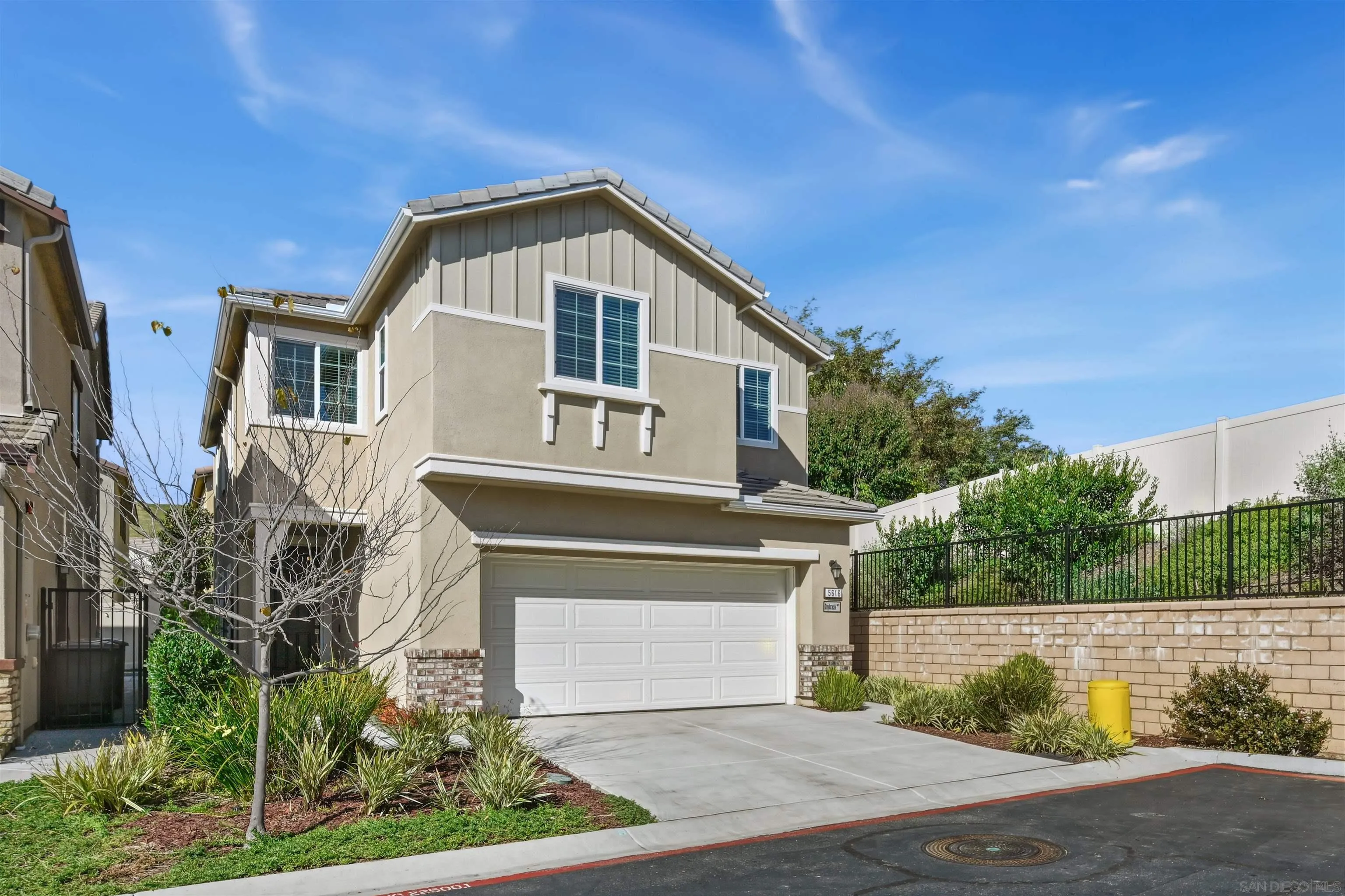 5616 Daybreak Way Bonsall, CA 92003 - Photo 1 of 24 a front view of a house with a yard