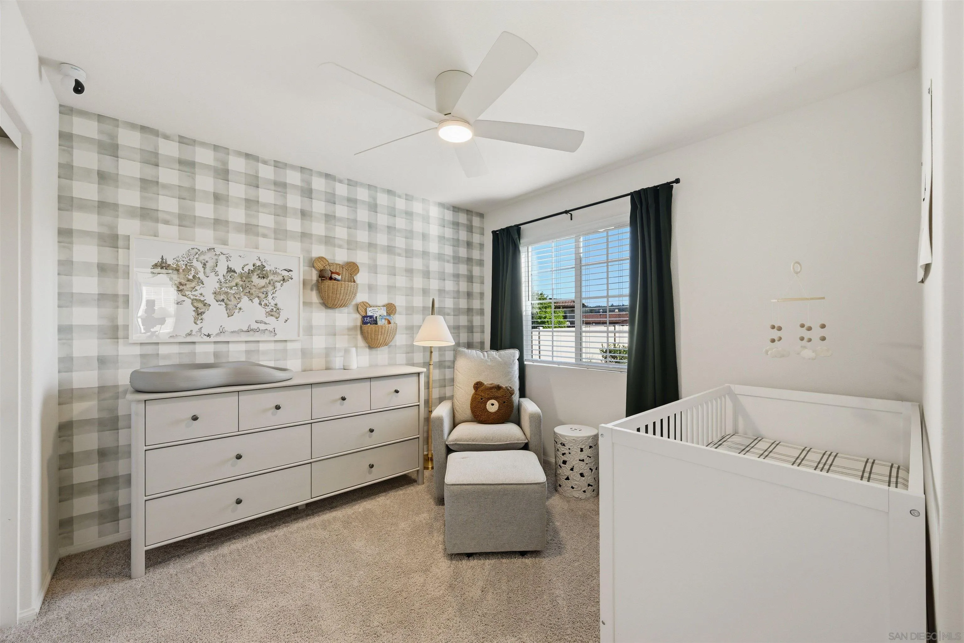 5616 Daybreak Way Bonsall, CA 92003 - Photo 15 of 24 a bed room with a bed and a dresser