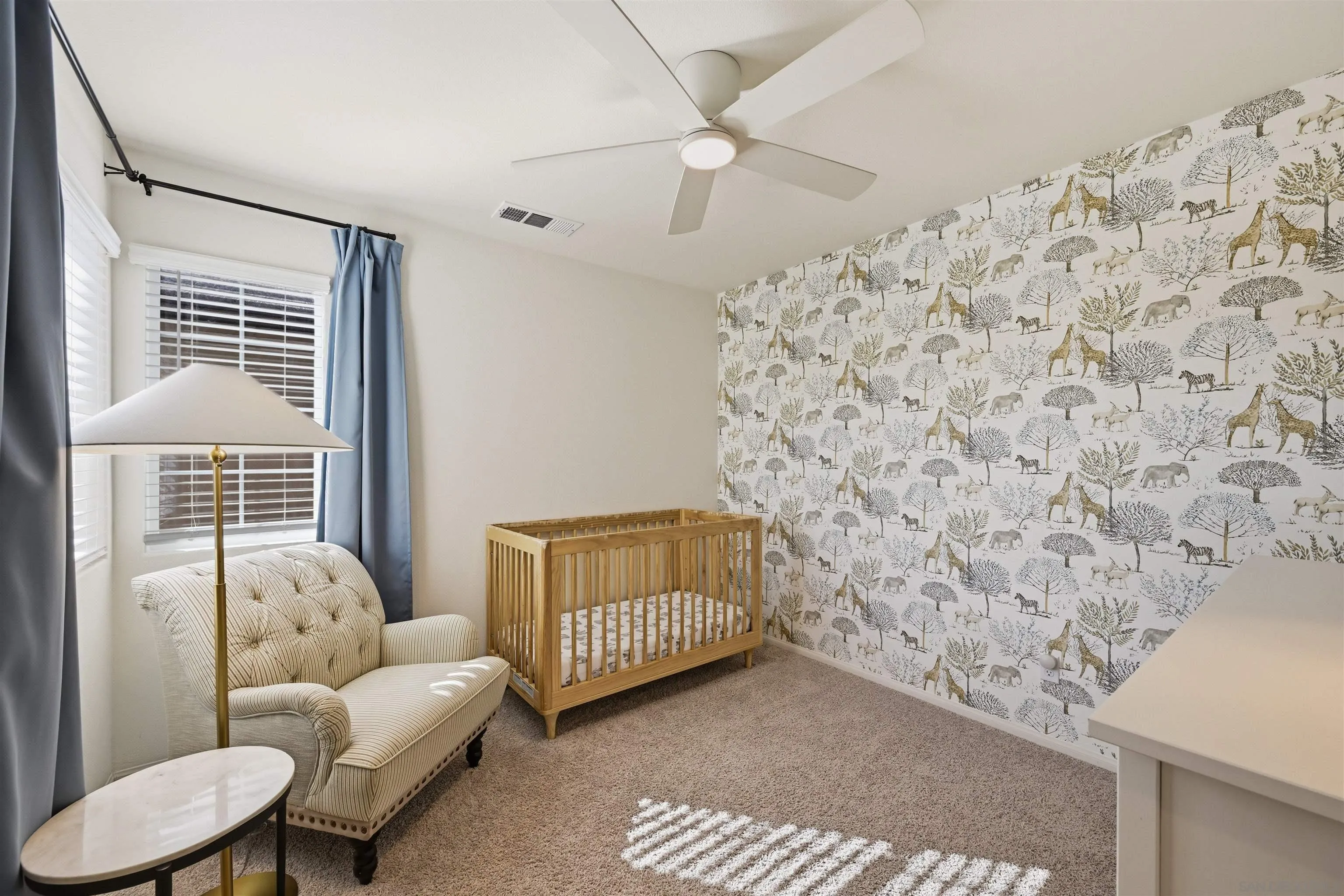 5616 Daybreak Way Bonsall, CA 92003 - Photo 16 of 24 a living room with furniture and a window