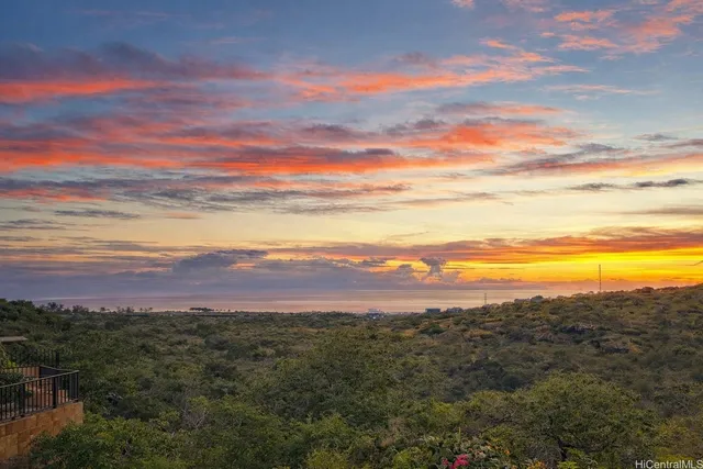 a view of a city with mountains in the background