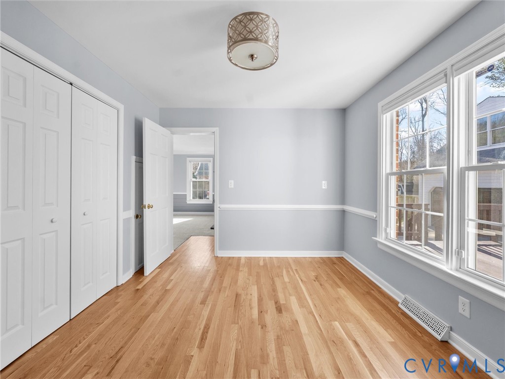 1330 Winslow Road Richmond, VA 23235 - Photo 20 of 46 a view of a room with wooden floor and windows