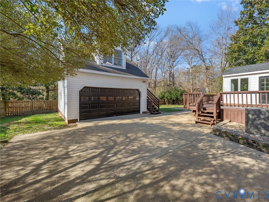 1330 Winslow Road Richmond, VA 23235 - Photo 39 of 46 a view of a house with a yard and garage