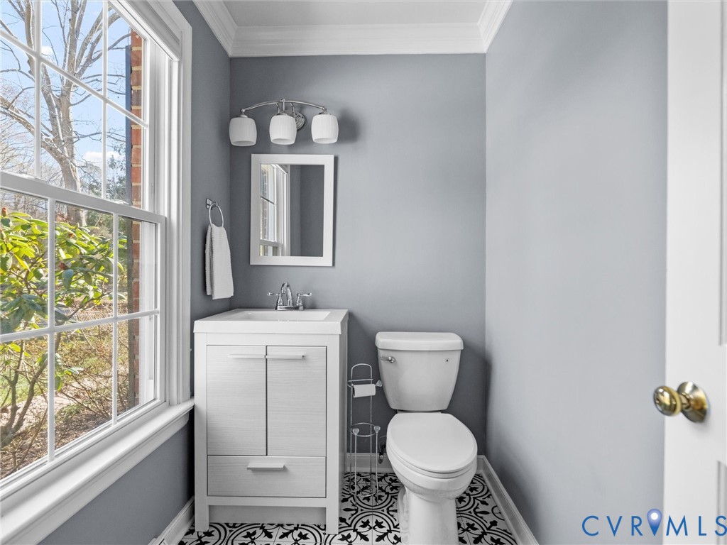 1330 Winslow Road Richmond, VA 23235 - Photo 10 of 46 a bathroom with a toilet sink and mirror