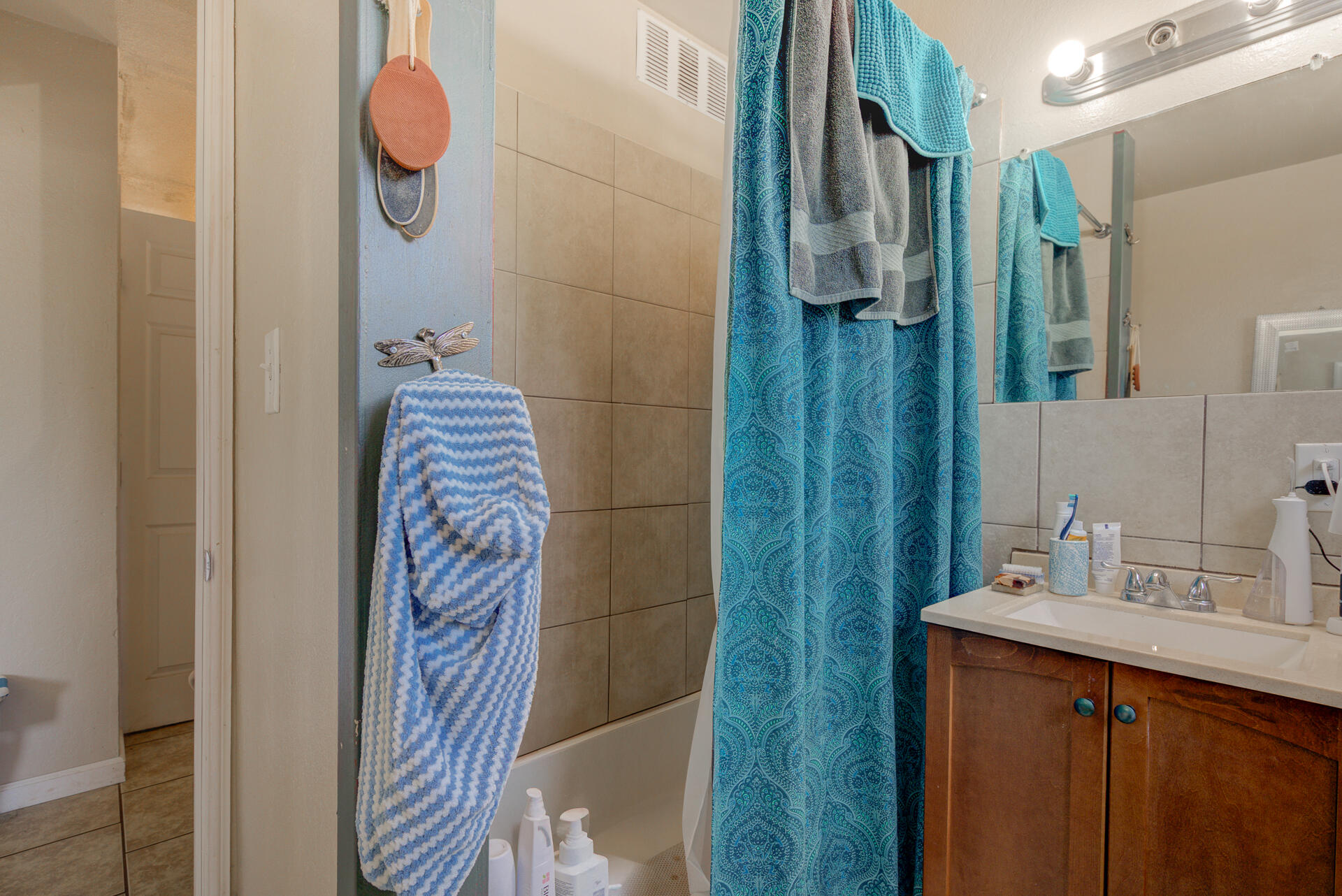 37153-55 Siskiyou Street Burney, CA 96013 - Photo 14 of 32 a bathroom with a sink and mirror