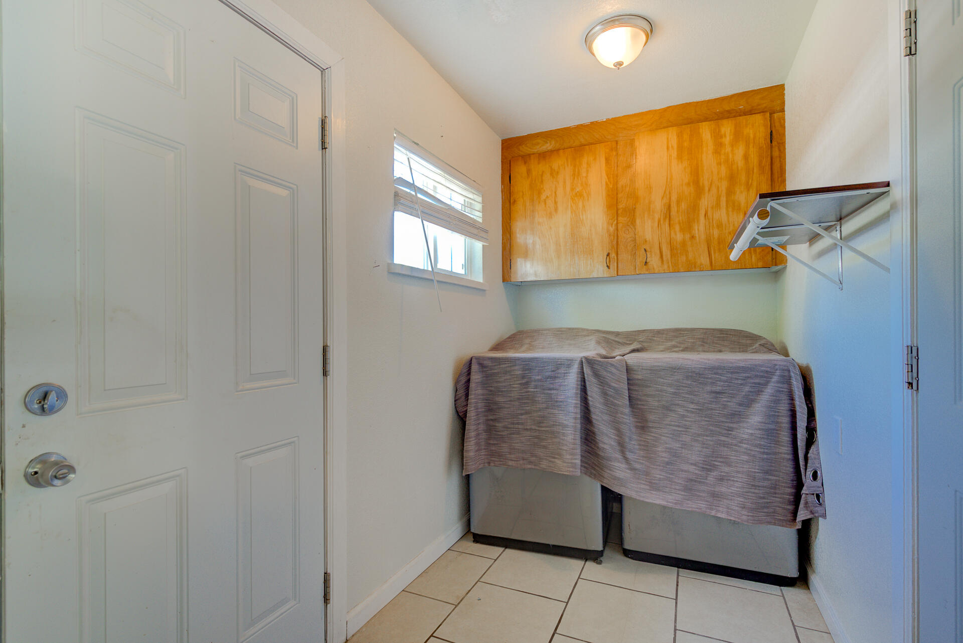 37153-55 Siskiyou Street Burney, CA 96013 - Photo 32 of 32 a bedroom with a bed and window