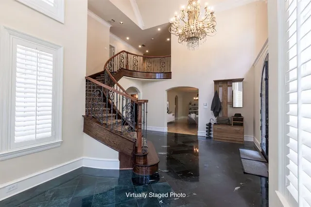 a view of entryway and hall with a window
