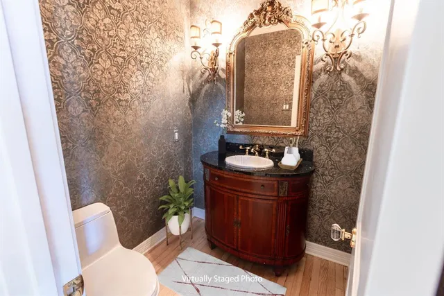 a bathroom with a sink and toilet