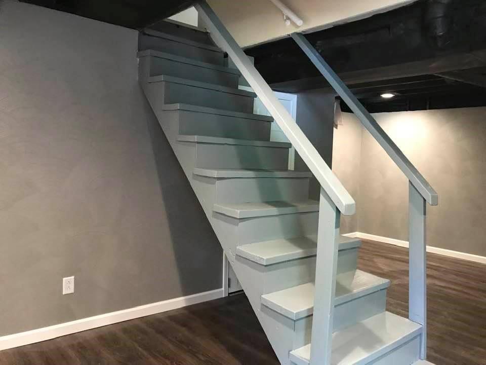 441 Agnew Road Jeannette, PA 15644 - Photo 22 of 25 stairwell to newly finished walk out basement with access through garage