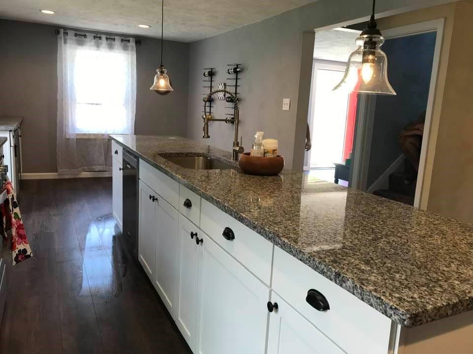 441 Agnew Road Jeannette, PA 15644 - Photo 7 of 25 3 mm granite countertops, undermount sink. cloche pendants , pull up USB port on this fantastic kitchen island