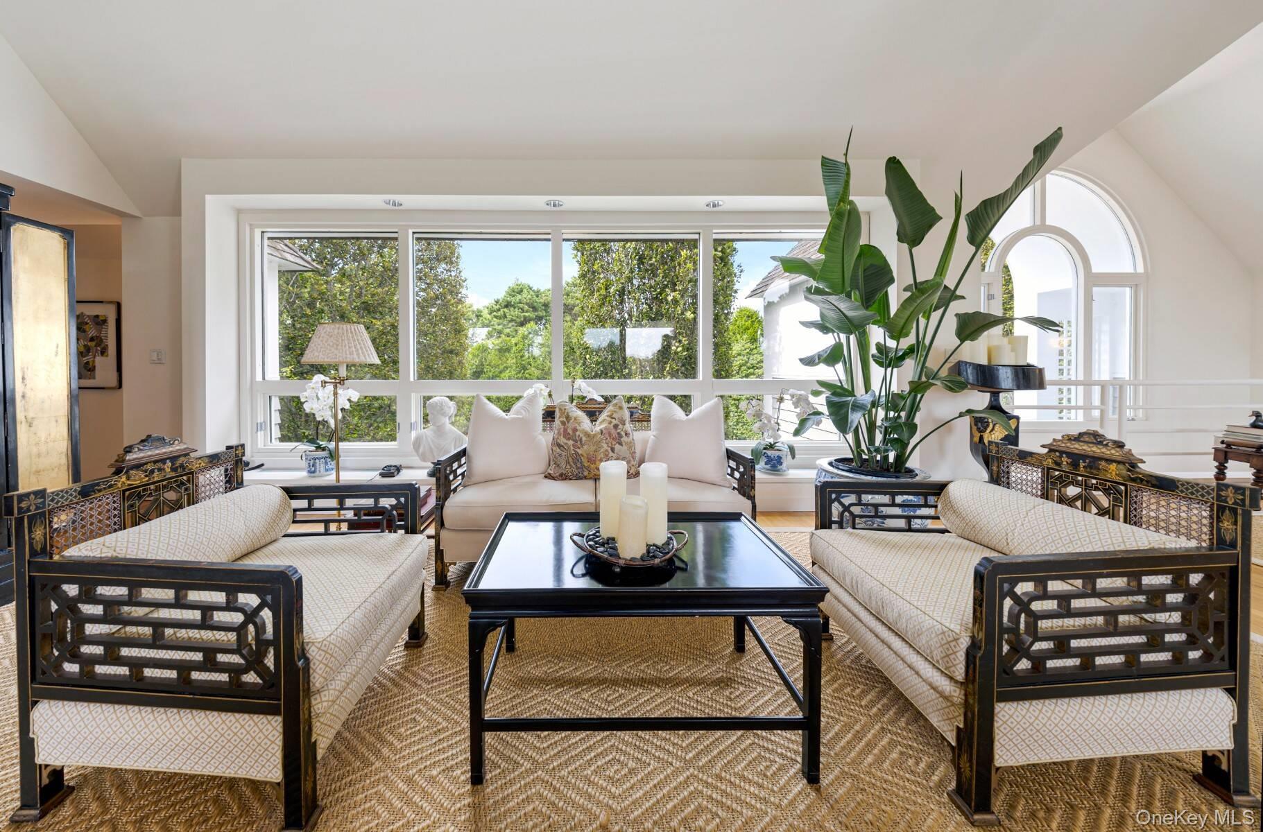 20 Hillside Road Southampton, NY 11968 - Photo 15 of 32 a view of a livingroom with furniture and a potted plant