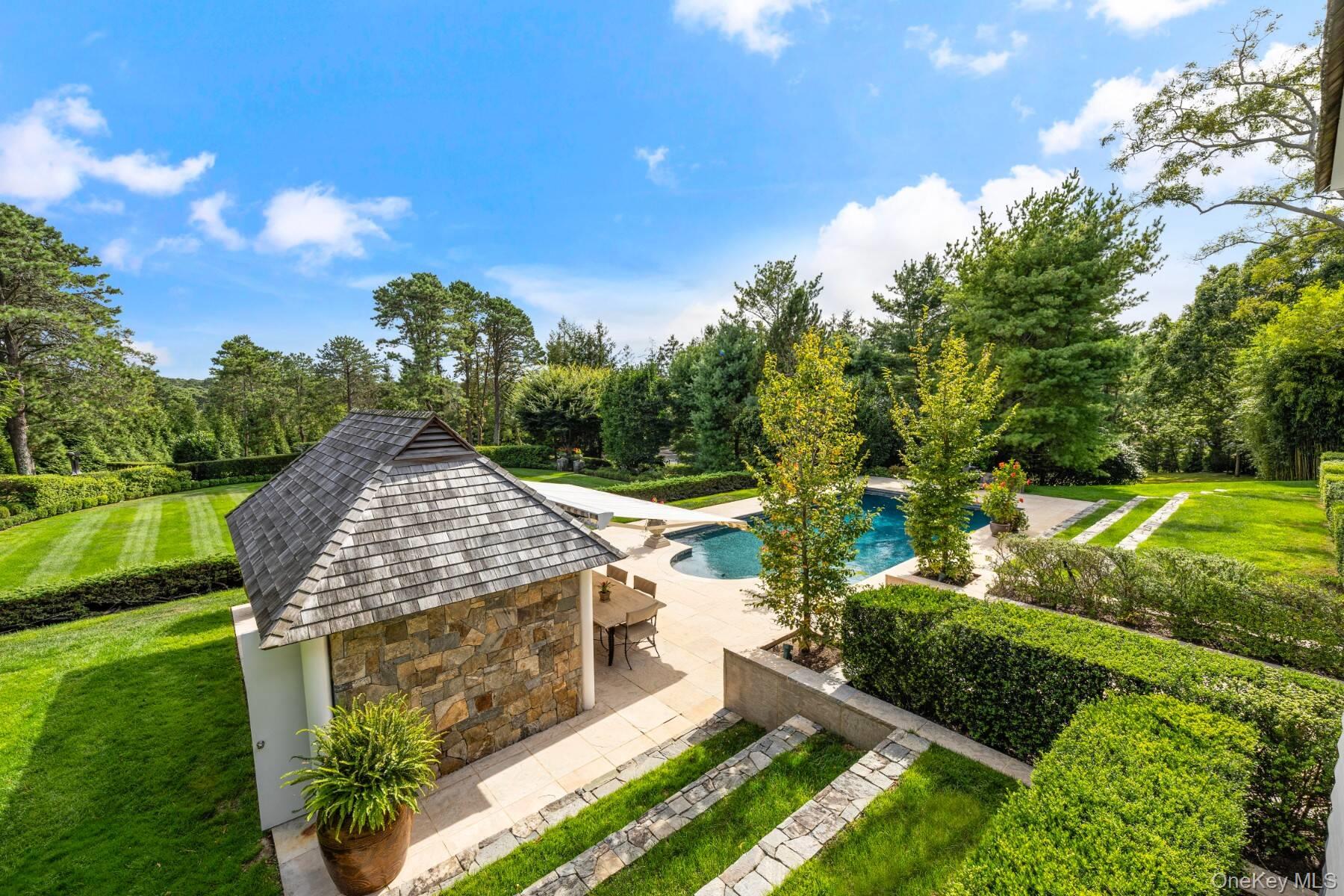 20 Hillside Road Southampton, NY 11968 - Photo 21 of 32 a view of a garden with an outdoor space