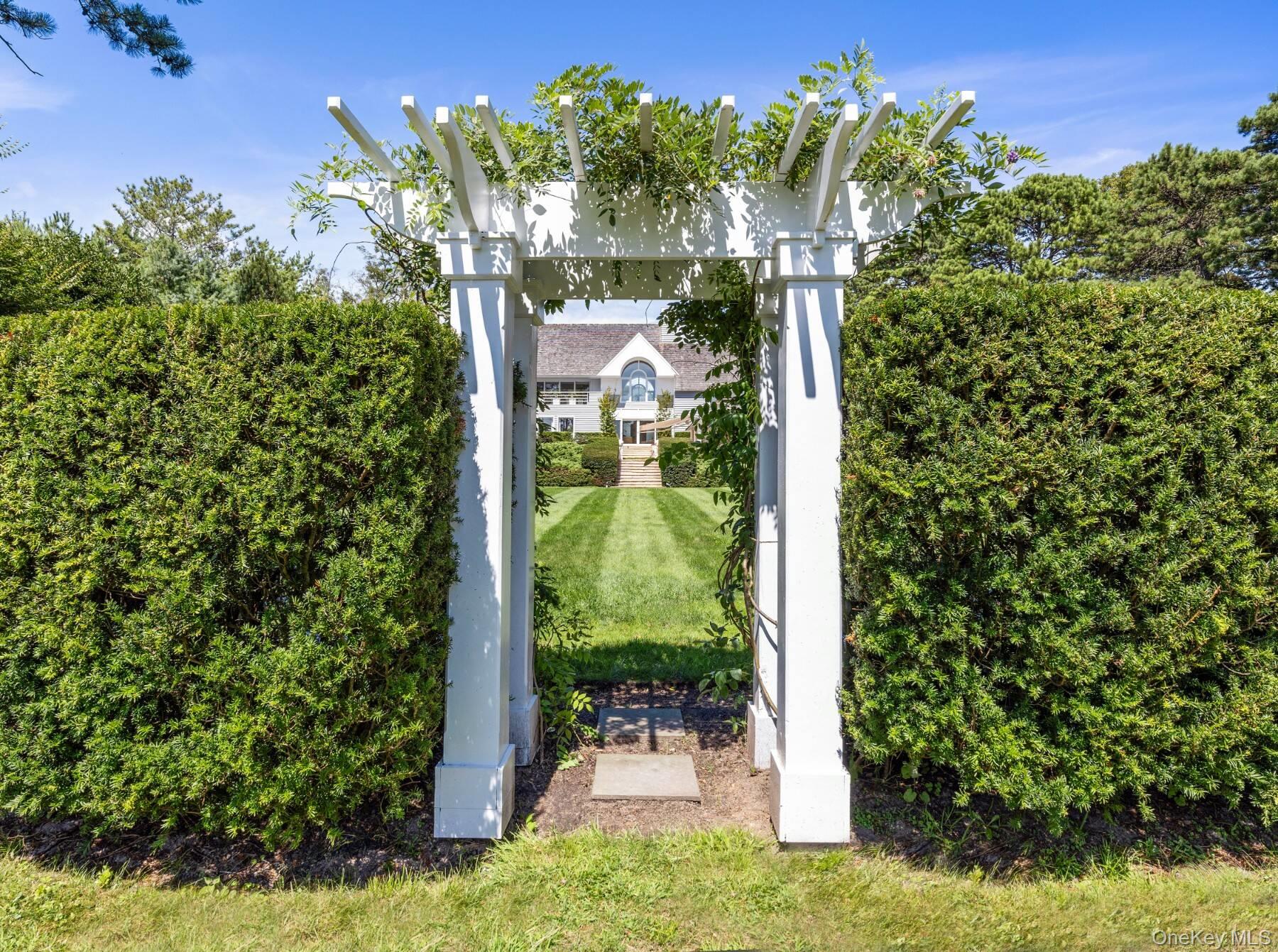 20 Hillside Road Southampton, NY 11968 - Photo 3 of 32 a backyard of a house with lots of green space