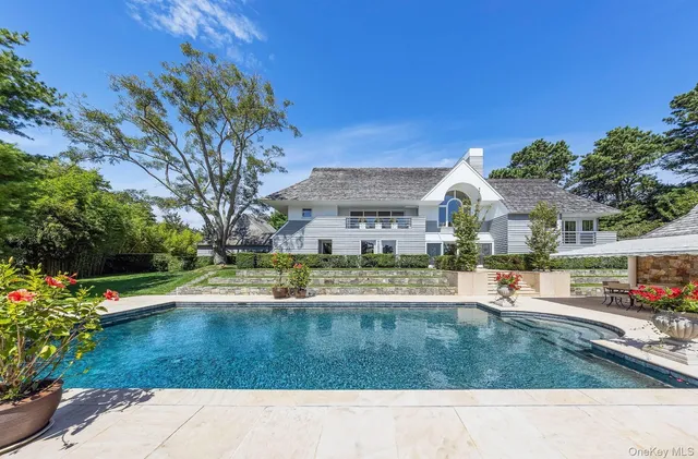 a view of a house with a swimming pool