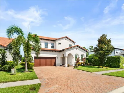 a view of house with yard and green space