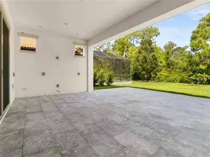 a view of livingroom with yard and trampoline