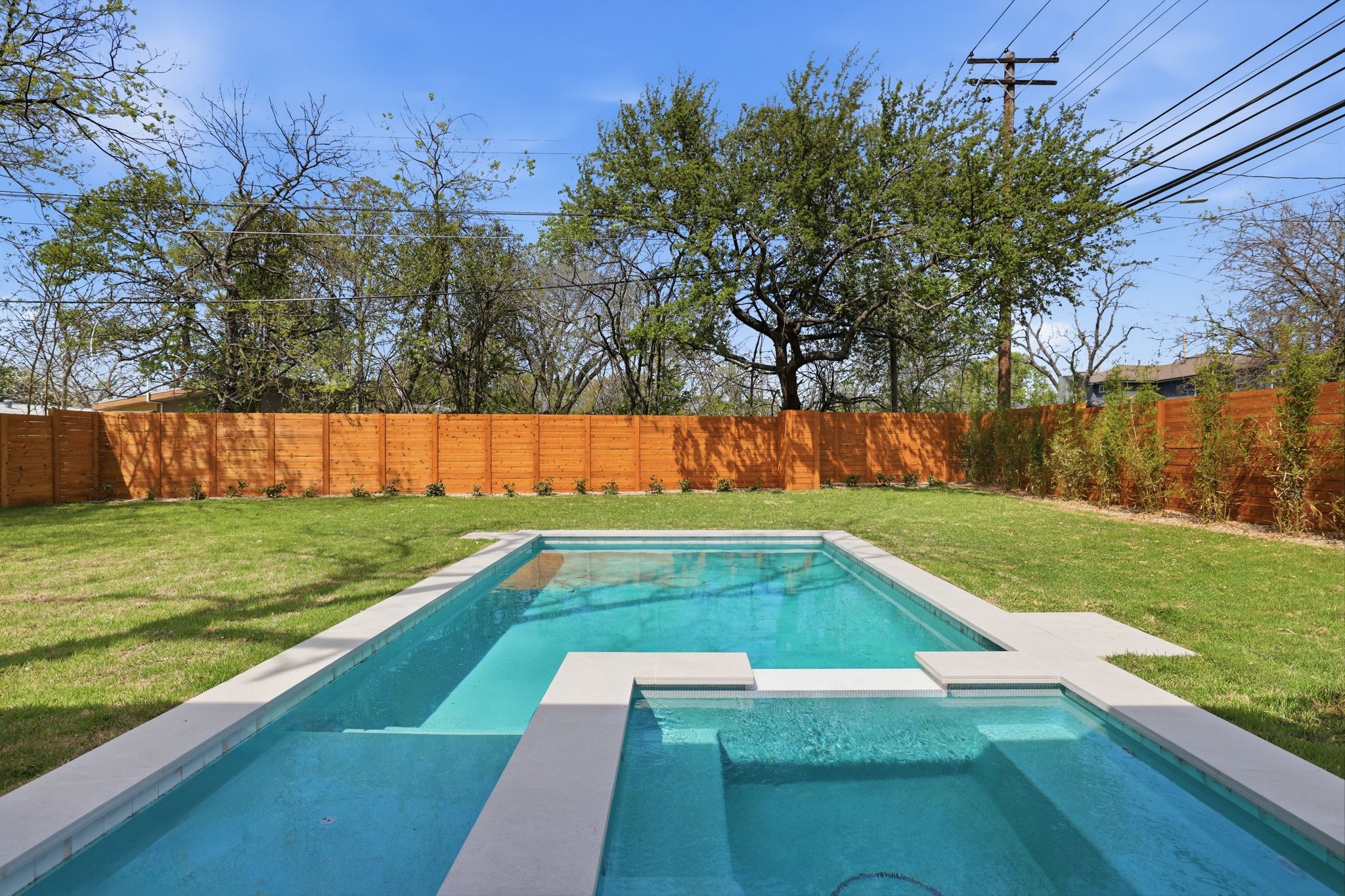 4500 Jinx Avenue Austin, TX 78745 - Photo 39 of 40 Combined pool / hot tub featuring a fenced backyard and a patio