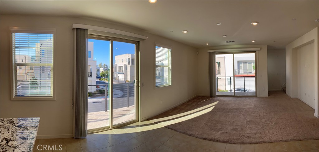 179 Cadence Irvine, CA 92618 - Photo 17 of 41 an empty room with windows
