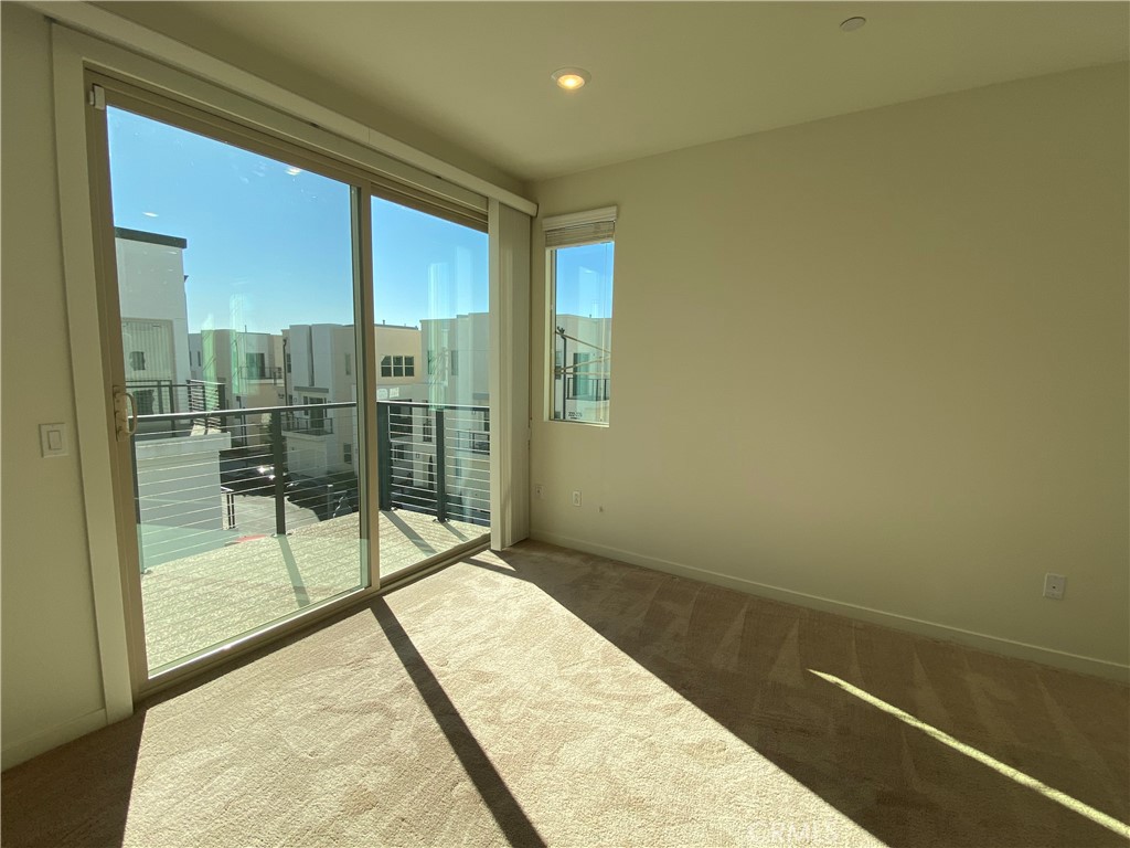 179 Cadence Irvine, CA 92618 - Photo 22 of 41 a view of a bathroom with a tub and shower