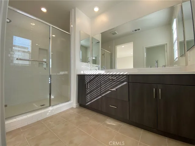 a view of an empty room with glass door