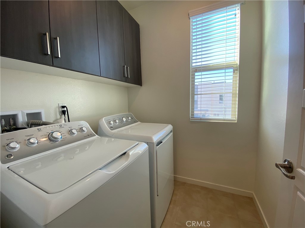 179 Cadence Irvine, CA 92618 - Photo 28 of 41 a utility room with dryer and washer