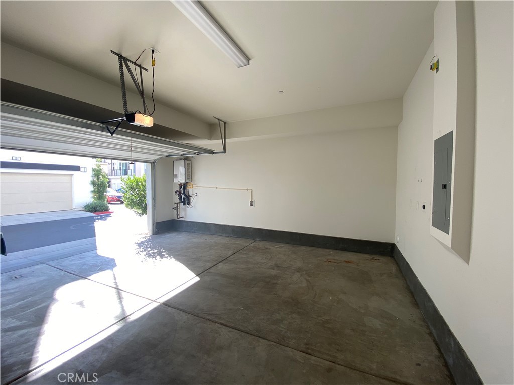 179 Cadence Irvine, CA 92618 - Photo 29 of 41 a view of empty room with wooden floor and fan