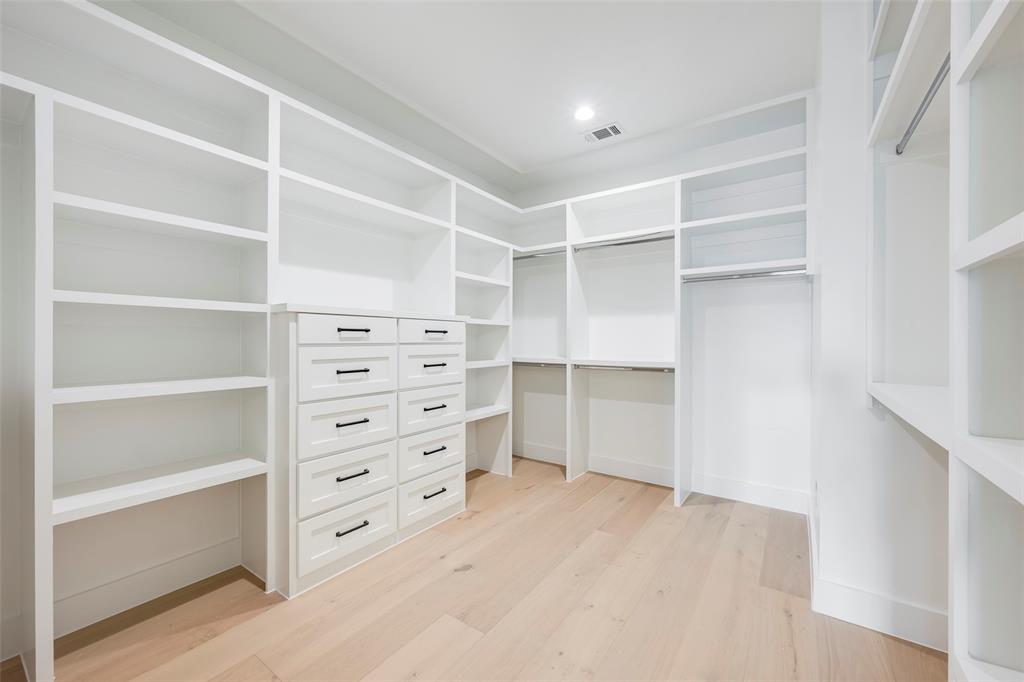5710 Vanderbilt Avenue Dallas, TX 75206 - Photo 15 of 37 a view of an empty walk in closet