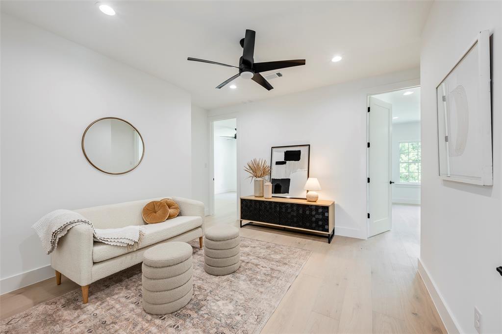 5710 Vanderbilt Avenue Dallas, TX 75206 - Photo 20 of 37 a living room with furniture and a window