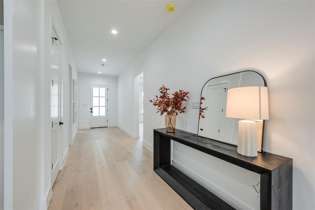 5710 Vanderbilt Avenue Dallas, TX 75206 - Photo 2 of 37 a view of entryway with flower pot and a sink