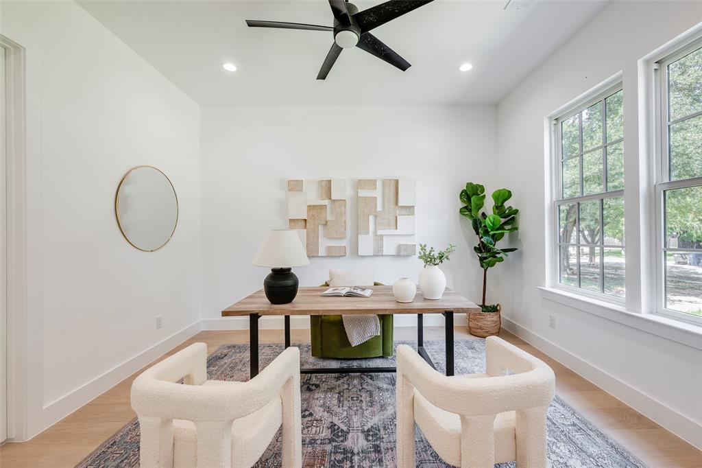 5710 Vanderbilt Avenue Dallas, TX 75206 - Photo 33 of 37 a living room with furniture and a large window
