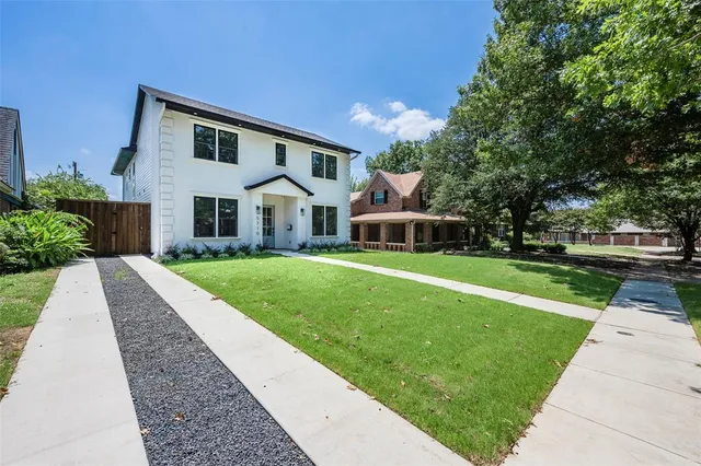 a house view with a garden space