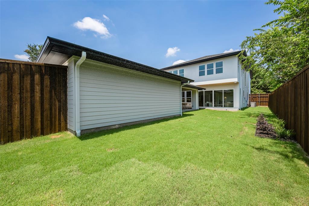 5710 Vanderbilt Avenue Dallas, TX 75206 - Photo 37 of 37 a house view with a garden space