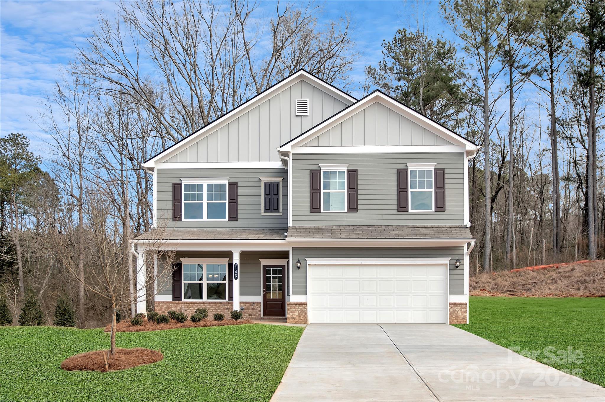 310 Wicker Drive Salisbury, NC 28147 - Photo 1 of 14 a front view of a house with a yard and trees