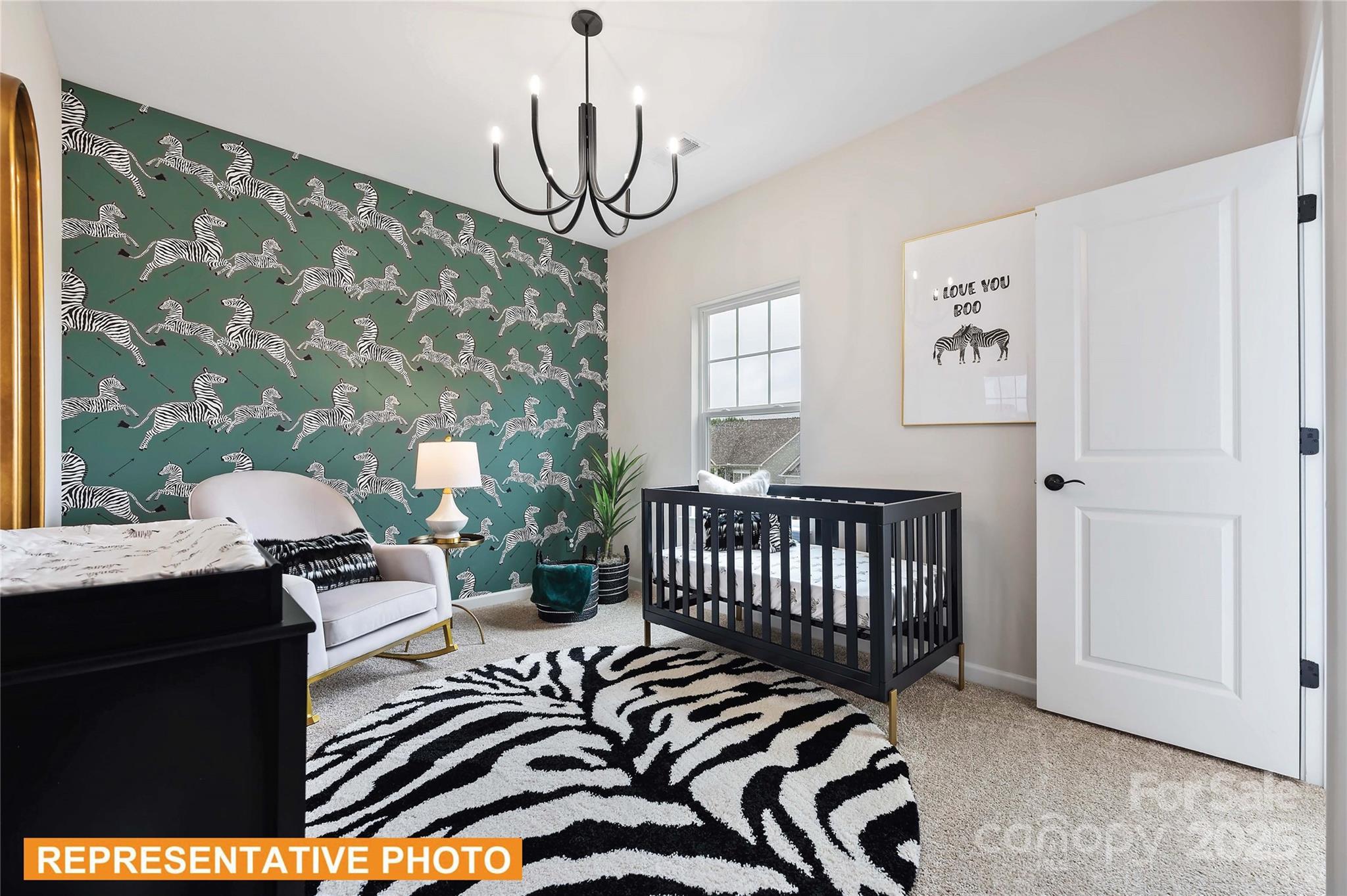 310 Wicker Drive Salisbury, NC 28147 - Photo 10 of 14 a bedroom with a bed and wooden floor