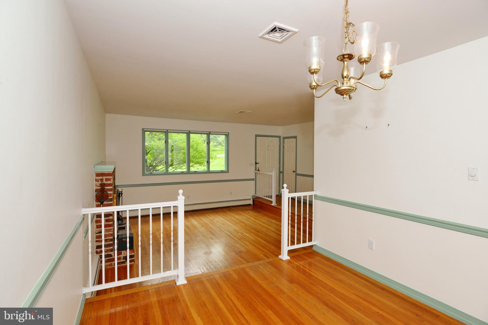 479 Quarry Road Harleysville, PA 19438 - Photo 14 of 33 View from Dining Room to Sunken Living Room