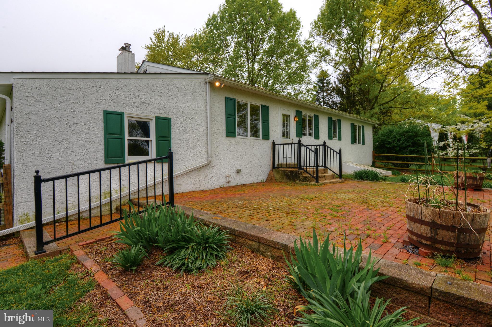 479 Quarry Road Harleysville, PA 19438 - Photo 3 of 33 Rear Brick Patio