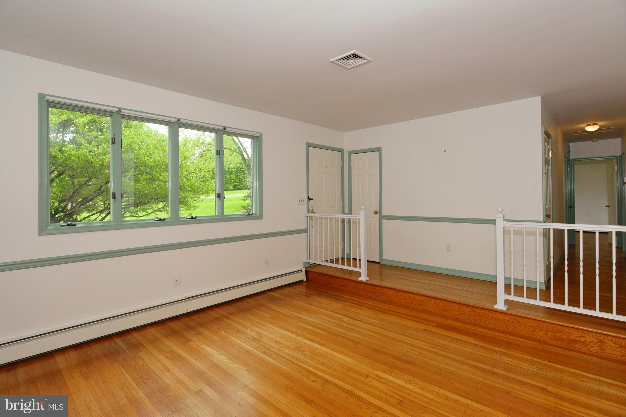 479 Quarry Road Harleysville, PA 19438 - Photo 4 of 33 Sunken Living Room with Hardwood Floors