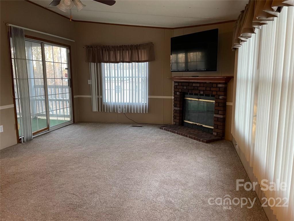 247 Tirzah Church Road, Unit 3 Lancaster, SC 29720 - Photo 14 of 31 a view of empty room with a fireplace