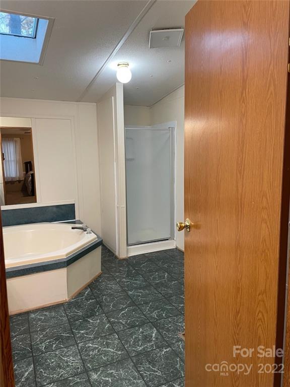 247 Tirzah Church Road, Unit 3 Lancaster, SC 29720 - Photo 23 of 31 a bathroom with a sink and a mirror